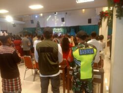 Babinsa, Linmas, dan Pecalang Jaga Natal Damai